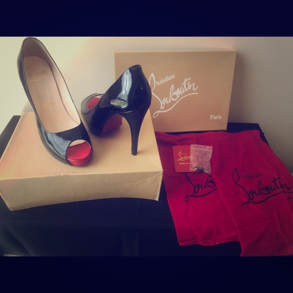Christian Louboutin Black Peep toe with red accent